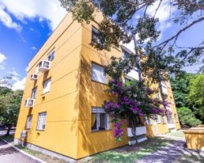 Apartamento à venda com 67m², 3 dormitórios, 2 vagas no bairro Guarujá em Porto Alegre