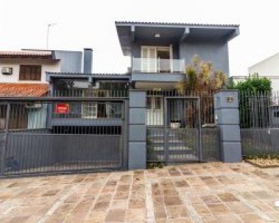 Casa à venda com 440m², 3 dormitórios, 3 suítes, 4 vagas no bairro Chácara das Pedras em Porto Alegre