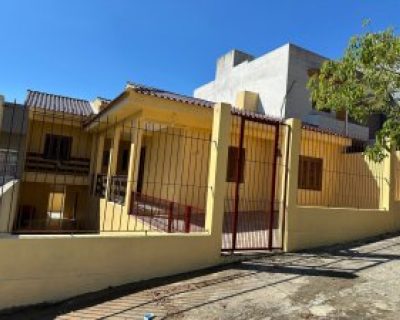 Casa à venda com 144m², 3 dormitórios, 3 vagas no bairro Lomba do Pinheiro em Porto Alegre