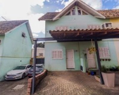 Casa em Condomínio à venda com 79m², 3 dormitórios, 1 suíte, 1 vaga no bairro Tristeza em Porto Alegre