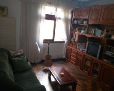 Apartamento à venda com 100m², 3 dormitórios, 1 suíte, 1 vaga no bairro Menino Deus em Porto Alegre