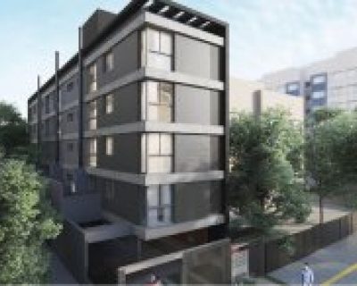 Apartamento à venda com 63m², 2 dormitórios, 1 suíte, 2 vagas no bairro Bela Vista em Porto Alegre