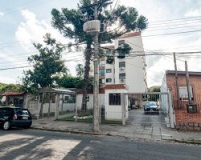 Apartamento à venda com 75m², 2 dormitórios, 1 suíte, 1 vaga no bairro Medianeira em Porto Alegre