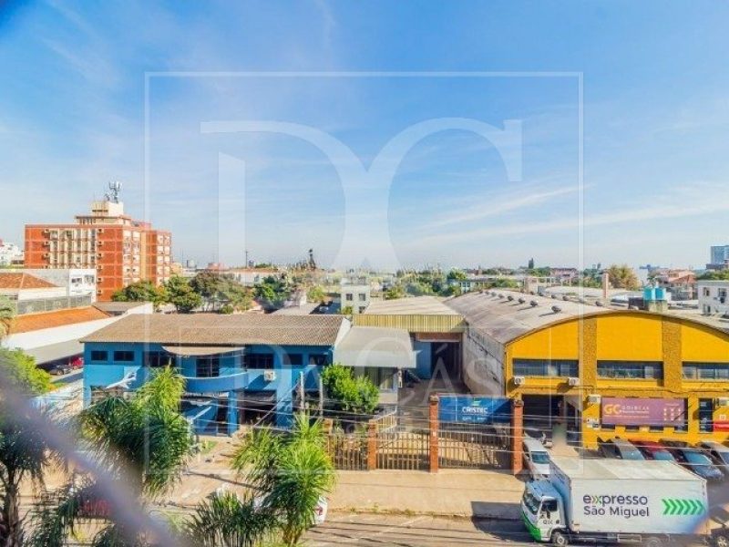 Apartamento à venda com 72m², 2 dormitórios, 1 suíte, 2 vagas no bairro São João em Porto Alegre