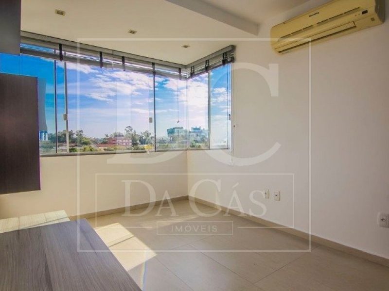 Apartamento à venda com 61m², 2 dormitórios, 1 vaga no bairro Camaquã em Porto Alegre