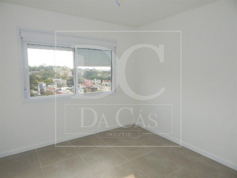 Apartamento à venda com 66m², 2 dormitórios, 1 suíte, 1 vaga no bairro Santo Antônio em Porto Alegre