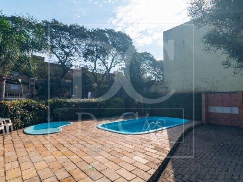 Casa em Condomínio à venda com 79m², 3 dormitórios, 1 suíte, 1 vaga no bairro Tristeza em Porto Alegre