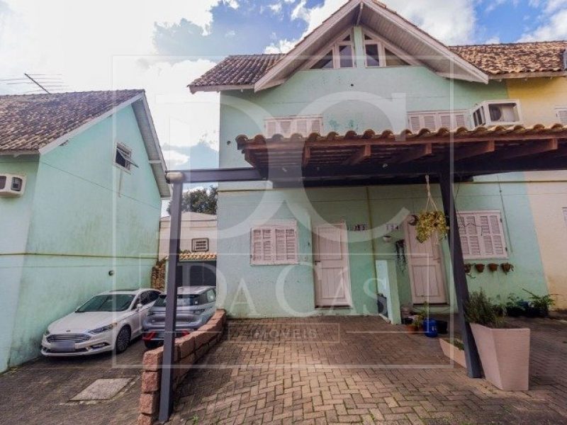 Casa em Condomínio à venda com 79m², 3 dormitórios, 1 suíte, 1 vaga no bairro Tristeza em Porto Alegre