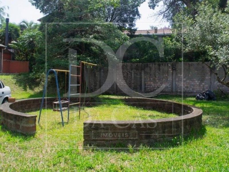 Casa em Condomínio à venda com 123m², 3 dormitórios, 2 suítes, 2 vagas no bairro Teresópolis em Porto Alegre