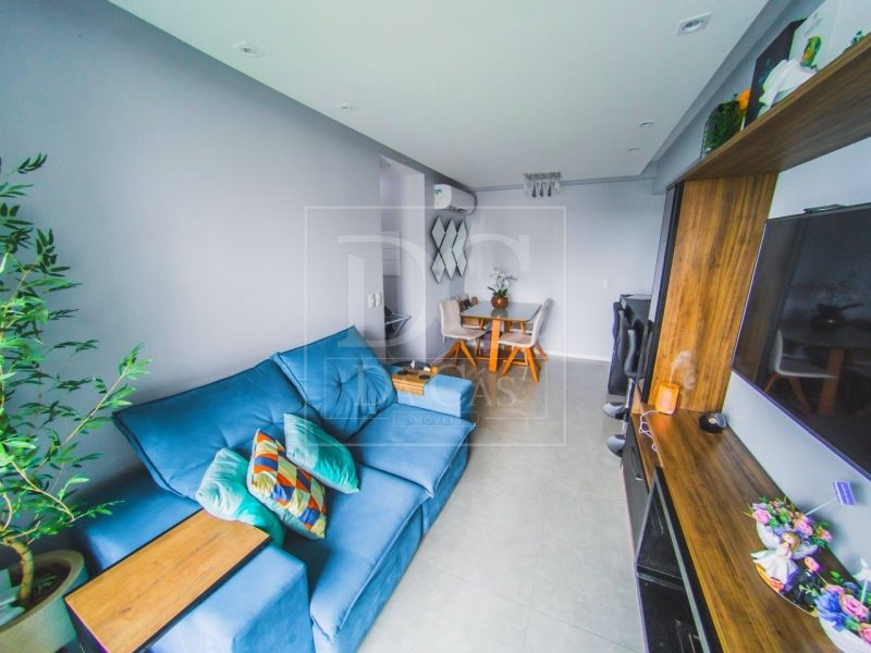 Apartamento à venda com 58m², 2 dormitórios, 1 suíte, 2 vagas no bairro Central Parque em Porto Alegre