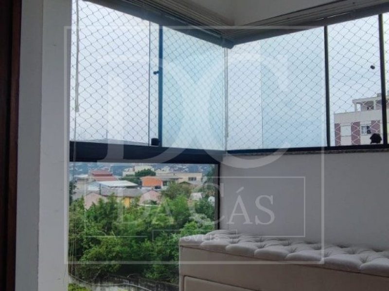 Apartamento à venda com 51m², 1 dormitório, 1 vaga no bairro Santo Antônio em Porto Alegre