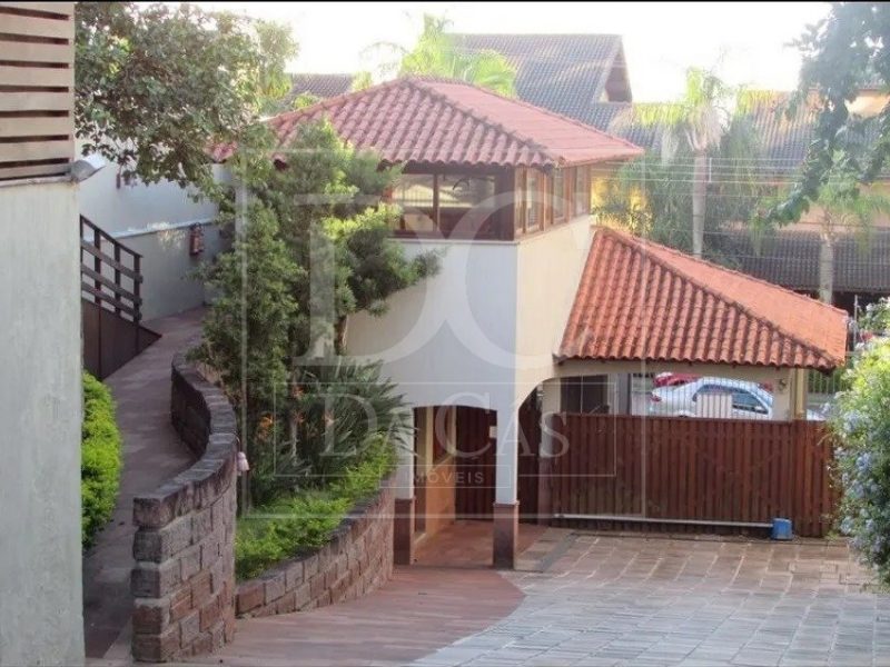 Casa em Condomínio à venda com 230m², 3 dormitórios, 1 suíte, 2 vagas no bairro Santa Tereza em Porto Alegre