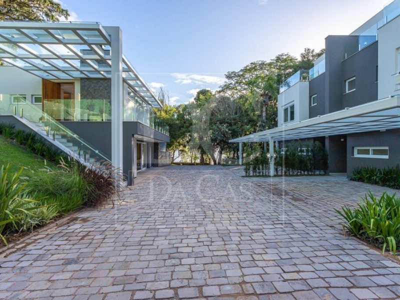 Casa em Condomínio à venda com 494m², 3 dormitórios, 3 suítes, 3 vagas no bairro Pedra Redonda em Porto Alegre