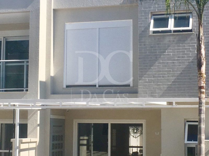 Casa em Condomínio à venda com 196m², 4 dormitórios, 2 suítes, 2 vagas no bairro Vila Nova em Porto Alegre