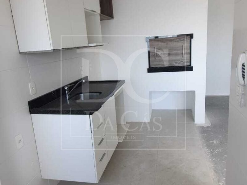 Apartamento à venda com 70m², 2 dormitórios, 1 suíte, 2 vagas no bairro Menino Deus em Porto Alegre